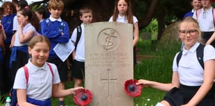 Children pay respects at war graves on D-Day anniversary 