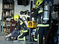 Search and rescue drill at garage for firefighters 
