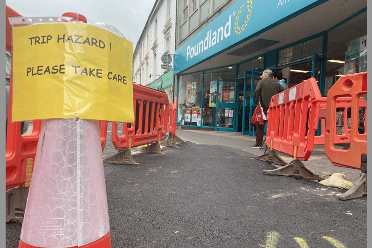 Signs advising people take care have been put up at the western end of Queen Street