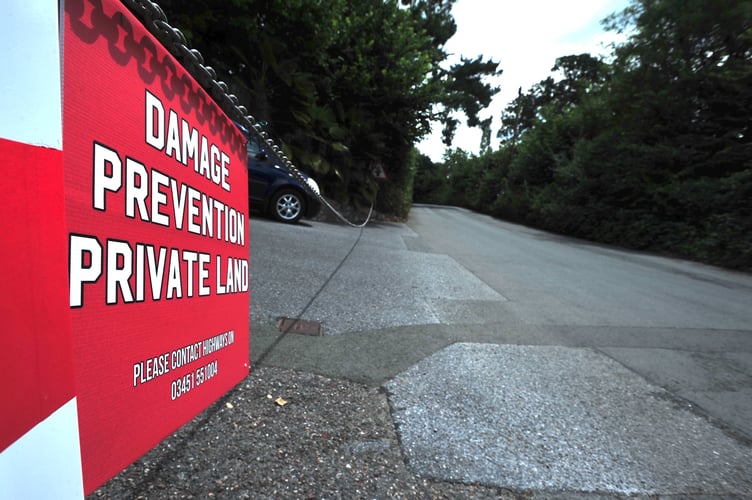 Residents damage prevention warnings along Coach Road in Newton Abbot.
