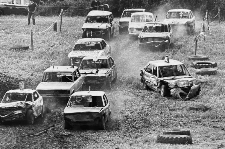 Banger Racing at Dawlish from August 1986. Engines scream and smokes pours if exhausts as the first heat of the day gets underway
