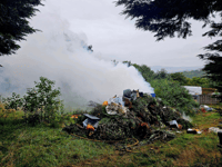 Fire crew tackles large waste pile fire 