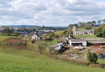 Road plans to controversial development narrowly approved