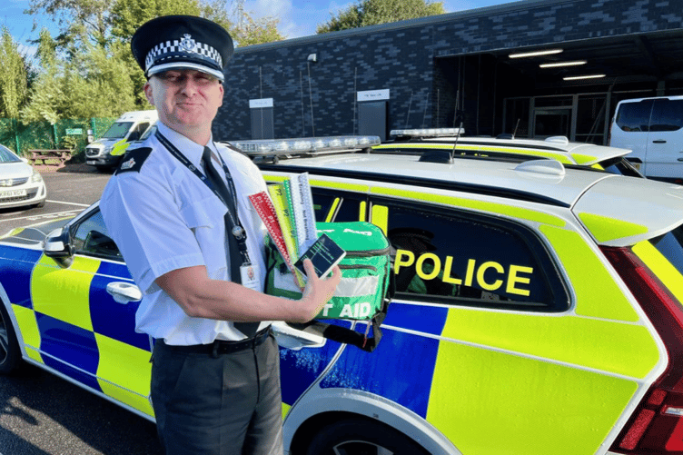 Superintendent Robert Youngman with First Aid bag, Ten Second Triage wristbands and Nalaxone box