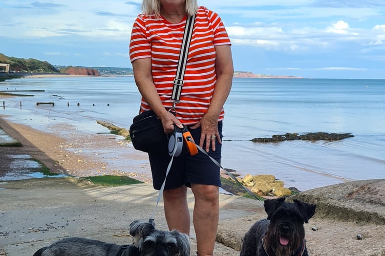 Linda Bowler, organiser of Dawlish Warren Schnauzerfest, with dogs Sally and Nova.
