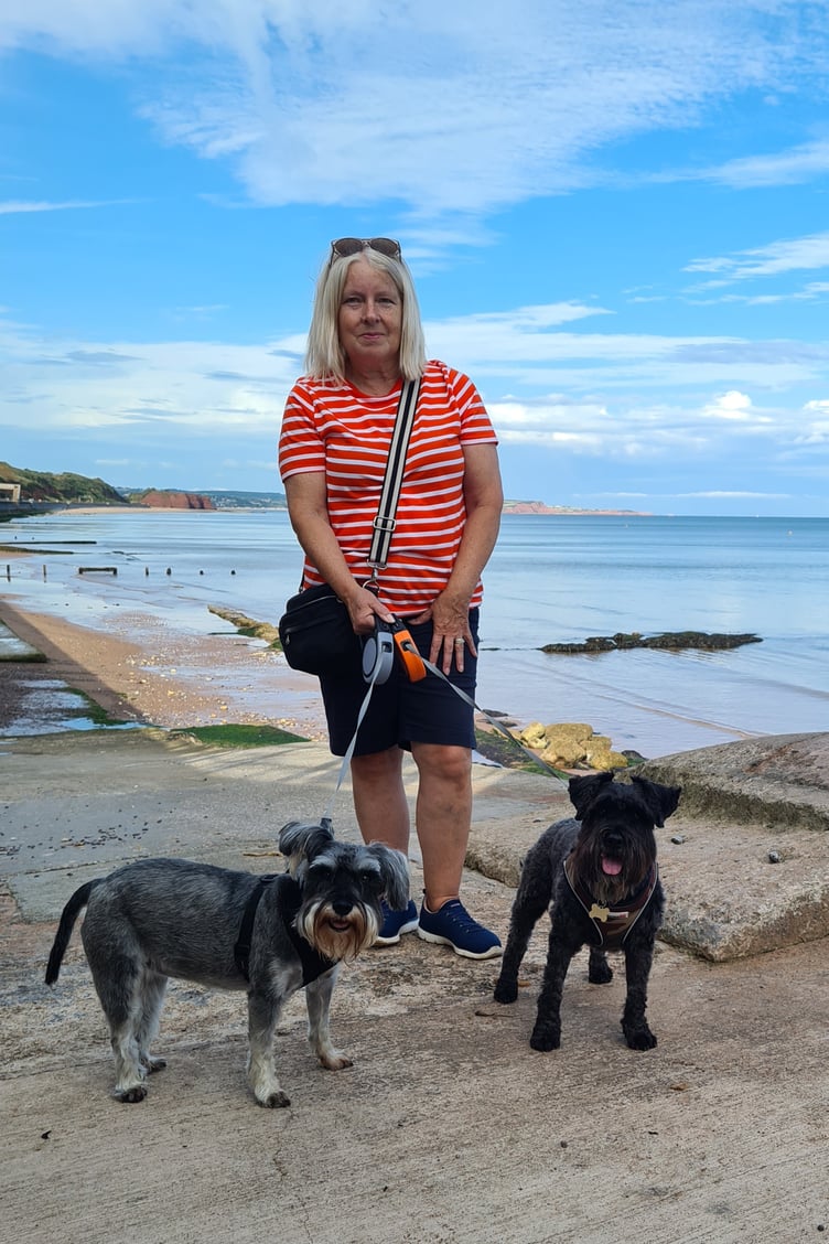Linda Bowler, organiser of Dawlish Warren Schnauzerfest, with dogs Sally and Nova.