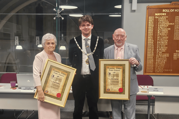 Newton Abbot Mayor Cllr Alex Hall with Honorary Freewoman Carol Bunday and Honorary Freeman Mike Hocking.