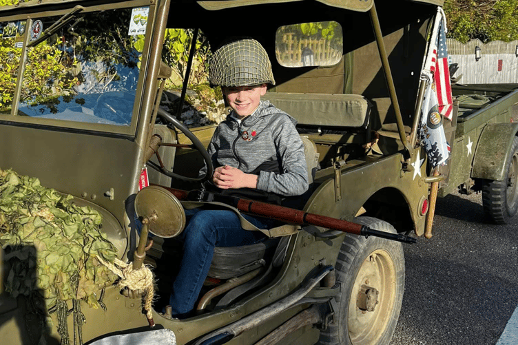 Arlo Fishleigh behind the wheel of Jim Portus' WW2-era military jeep