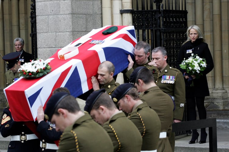 FILE PHOTO - Staff Sergeant Olaf Schmid's wife Christina, wearing her husband's medals at Truro Cathedral after the memorial service for her husband. 24 Nov 2009. Photo released November 26 2024. A war widow whose army husband died defusing a Taliban bomb in Afghanistan has arrived at court today (Tues) accused of assaulting her second husband. Christina Schmid, 49, previously pleaded not guilty to two counts of assault by beating Adam Plumb, 41. JPs previously heard police were called to a disturbance at Ms Schmids £1.5million eight-bed mansion in the village of Ugborough, Devon, on 17 September 2023. She arrived at Newton Abbot Magistrates Court in Devon today for a planned trial.