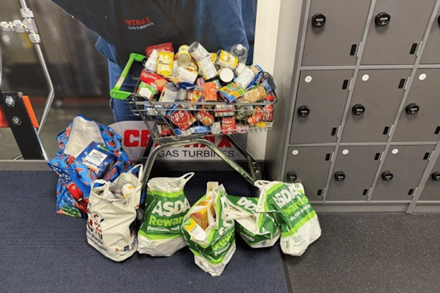 Students spread festive cheer with food bank donations 