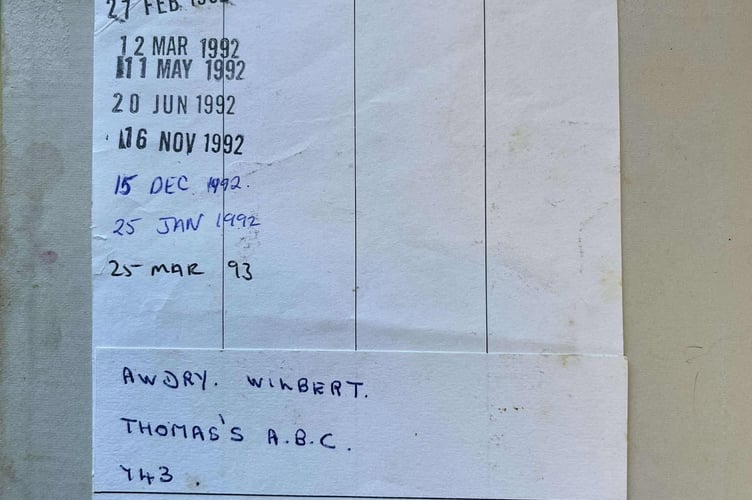 The date label inside the book.
