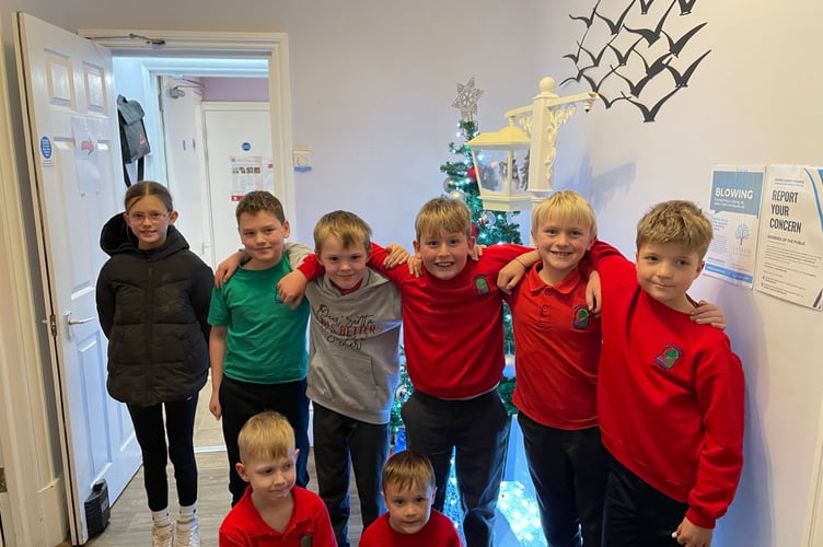 Children from Hazeldown Primary School visited residents at Croft Lodge Care Home. 