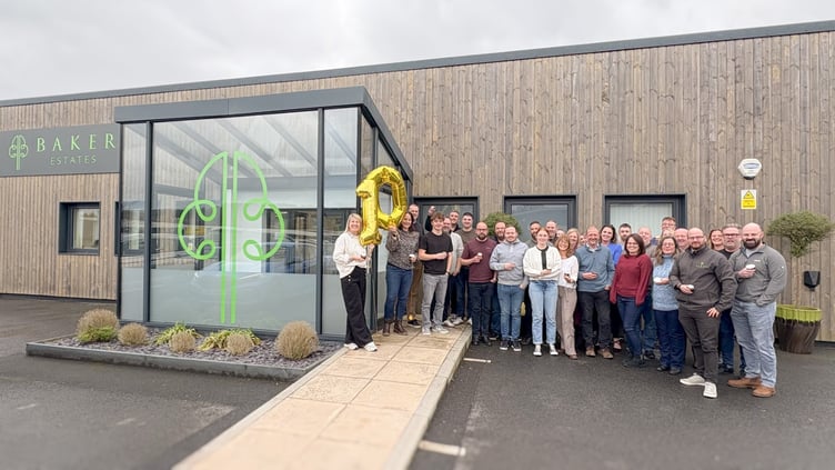 Baker Estates staff celebrate at the Newton Abbot headquarters.