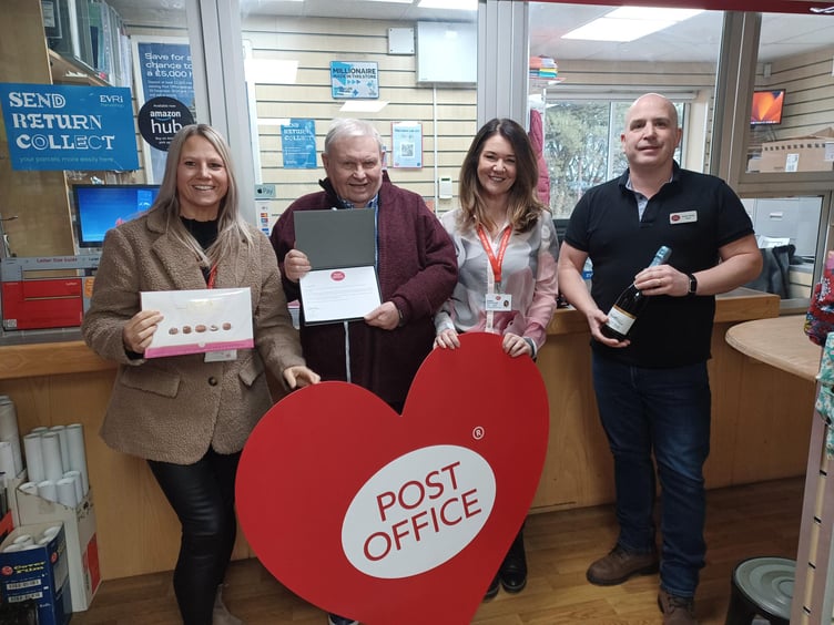 Roger Honey receives his 50 year long service award.