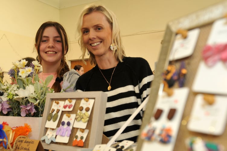 Newton Abbot Youth Council Art and Craft Fayre at the Courtenay Centre. Handmade earings from Isobel Lessiter (12) from Tiverton pictured here with mum Sasha