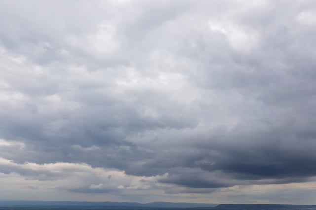 Misty start turning partly cloudy, patchy rain possible tomorrow