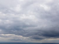 Misty start turning partly cloudy, patchy rain possible tomorrow