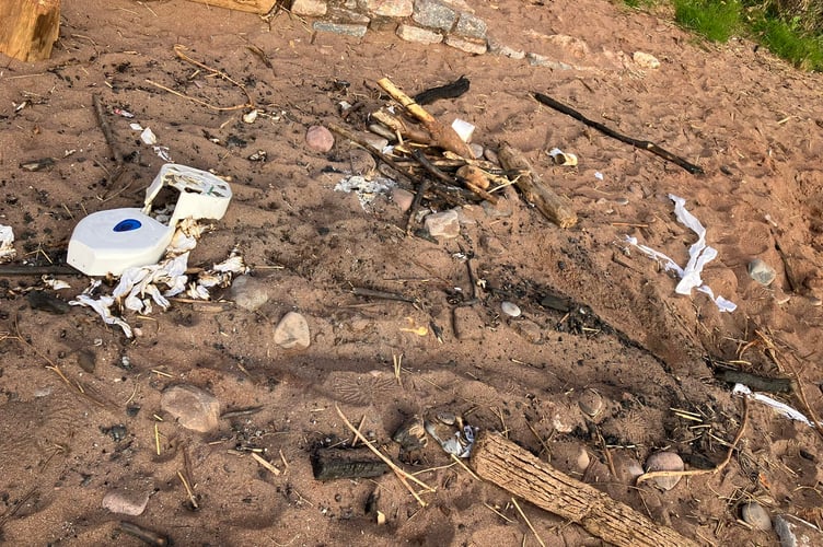 A toilet roll dispenser and loo roll from a public toilet has been dumped at Coryton. Photo Eyes of Dawlish
