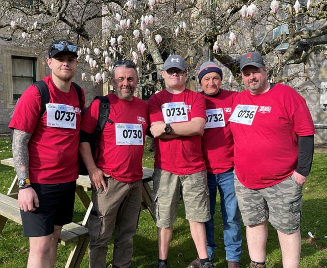 Teenager joins charity walk in memory of his dad
