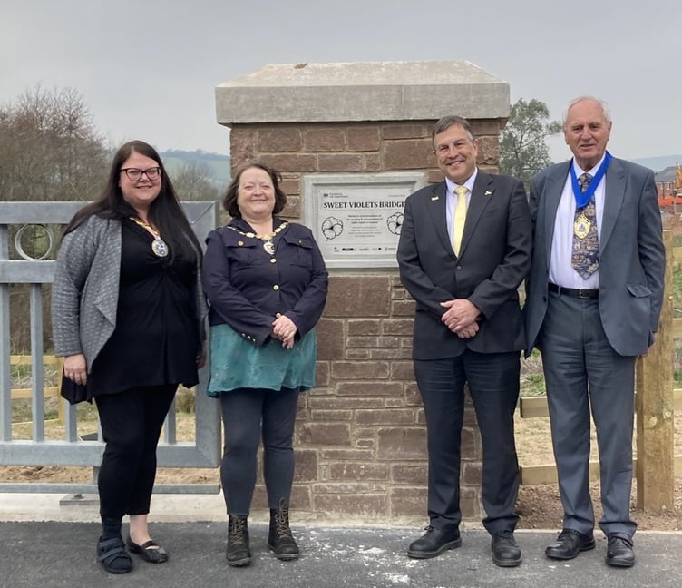 Official opening of new Dawlish link bridge, left to right Rosie Dawson, Teignbridge Council chairman and Dawlish town councillor, Mayor of Dawlish Cllr Lin Goodman-Bradbury, MP Martin Wrigley and chairman of Devon County Council Cllr John Hart.