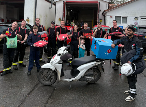 Fire crew's pizza-fuelled car wash raises grand for charity 