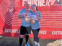 Newton Abbot pair raise £16k for cancer unit