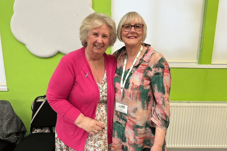 Newly-elected President Karen Jenks, left, thanked outgoing president Elaine Menzies for her three years at the helm