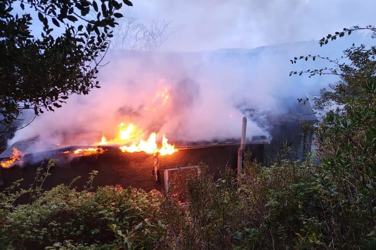 Fire fighters from Yelverton, Bere Alston and Tavistock fight a roof fire in. house on Kilworthy Hill, Tavistock.