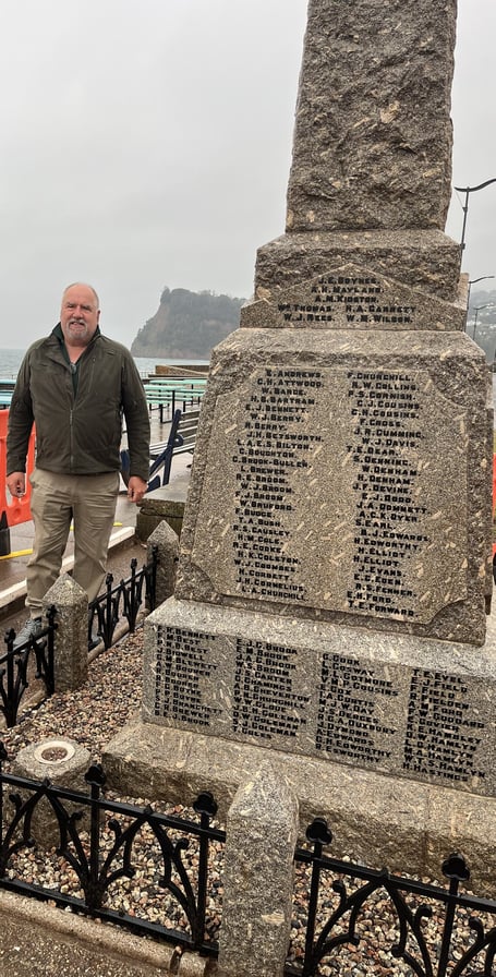 Expert restorer Steve Davies at Teignmouth War Memorial. Photo Teignmouth Town Council