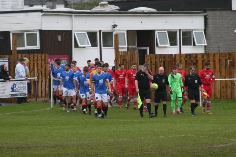 Here come the Newton Abbot Spurs and Teignmouth AFC players