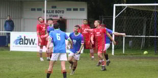 Rain-soaked rivalry match ends honours even