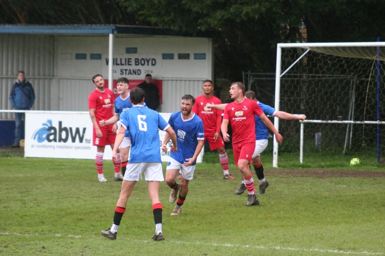 Owen Green celebrates opening the scoring for NA Spurs