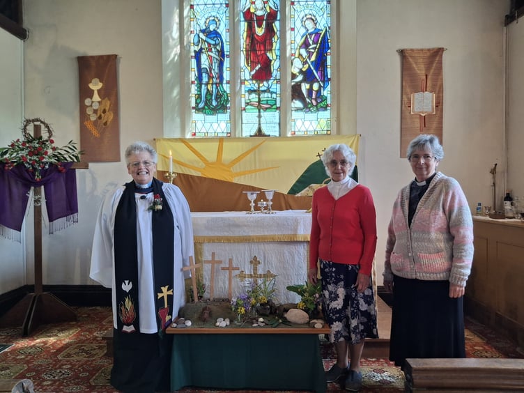 Celebrating the 80th anniversary of St George's Church Holcombe are, left to right, Rector of the Dawlish Coast Mission Community, Revd Linda Cronin. and former vicars of St George's Revd Helen Bays and Preb Chris Curd. Photo Lin Goodman-Bradbury