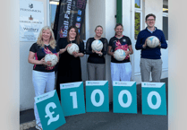 Teignmouth netball team scores developer donation