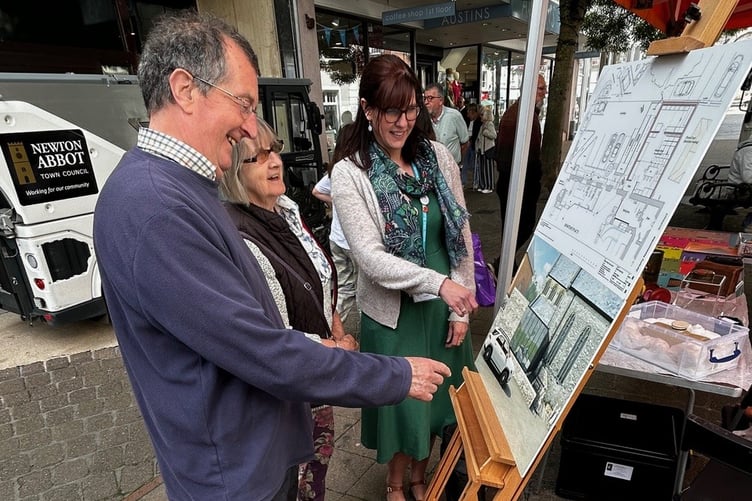 David and Jane Clarkson with Dr Dixon and the What’s in Store? display