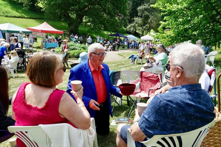 Crowds enjoy the sun at Luscombe Charity Day. Photo Bob Simpson