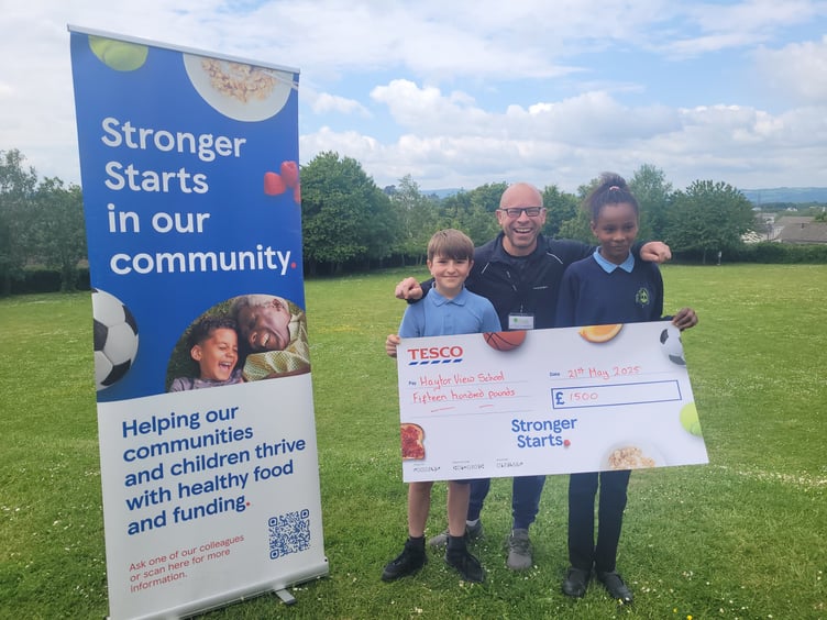 Graeme Hankin, Senior Leader at Haytor View Community Primary School, with Alf and Audrey.