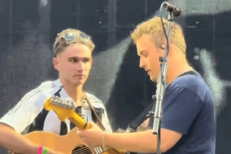 Joseph, left, with Sam Fender as the duo perform 'The Borders' to 50,000 fans at St James' Park