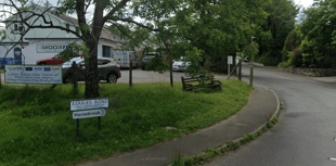Occupants flee after car crashes into village wall 