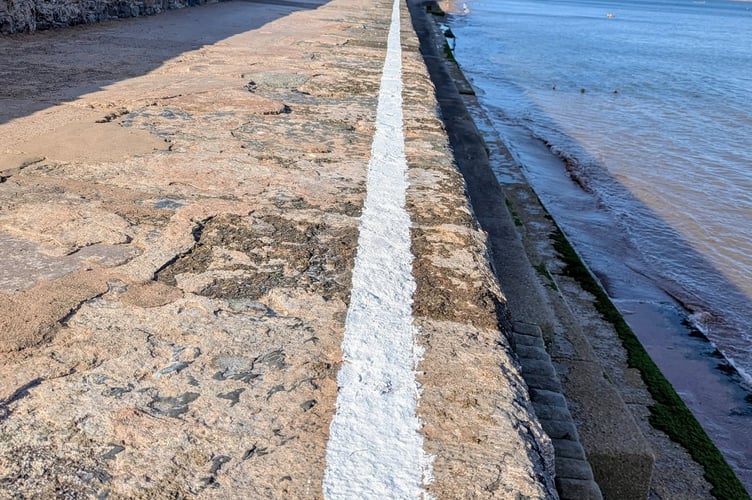 New white line has been painted along Dawlish sea wall. Photo Eyes of Dawlish 