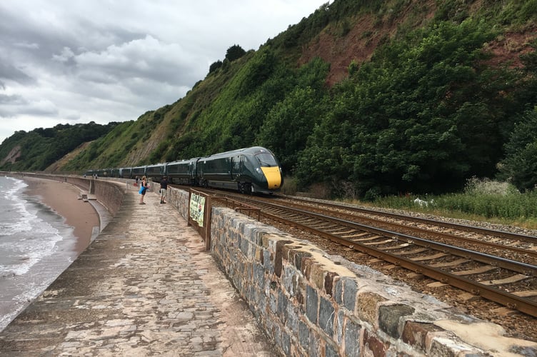 Train along the line between Dawlish and Teignmouth. Photo Network Rail 