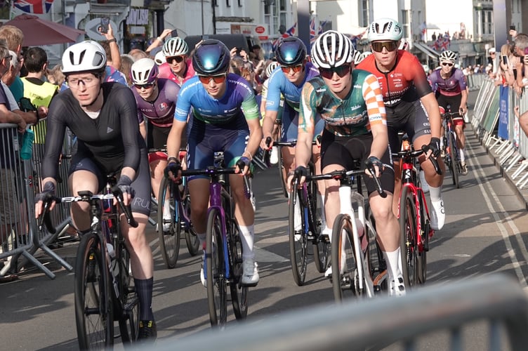 Wheel-to-wheel racing as the women hurtle through Dawlish town centre. Photo: Bob SImpson                               