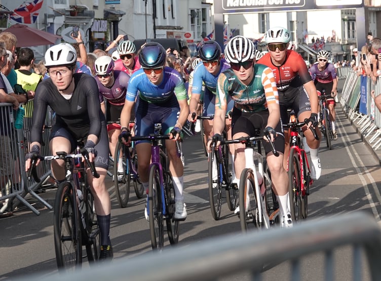 Wheel-to-wheel racing as the women hurtle through Dawlish town centre. Photo: Bob SImpson