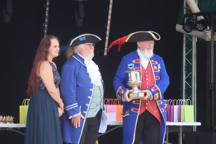 Dawlish Town Crier Bob Graham with his Armada Cup. Photo Tom Ladds