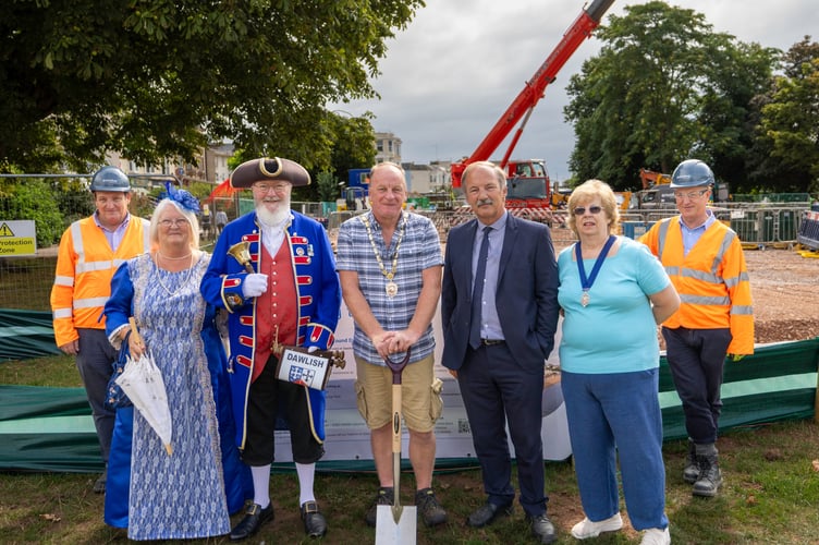 Pictured (L-R) Carl Wynn, Envolve Infrastructure; Heather Graham, Dawlish Town Crier’s wife and escort; Bob Graham, Dawlish Town Crier; Councillor Anthony James, Mayor of Dawlish; Graham Murphy, South West Water’s Chief Engineering Officer; Councillor Lynda Littlewood, Deputy Mayor of Dawlish; Mark Allen, Envolve Infrastructure Photo Neil Salter, Coast Cams. 