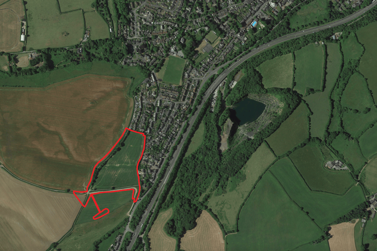 The section outlined in red shows the proposed site