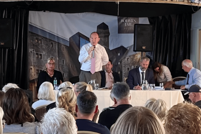 Cllr Adam Billings addresses the Preston beach hut owners meeting