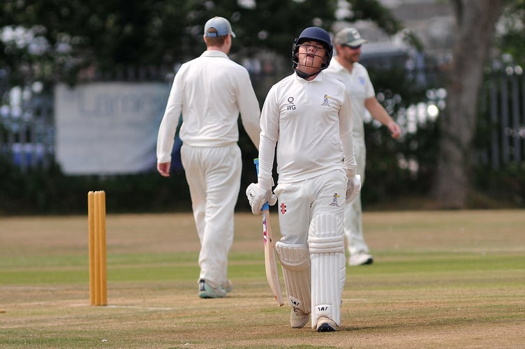 Devon Cricket League C Division West. South Devon 1st XI versus Ipplepen 2nd XI. Pen's batsman Warrick Green heads back to the pavilion having been caught by Mali Marshall off a ball from Jack Allen.
Ipplepen won the toss and elected to bat making 192 all out after 41.5 overs. South Devon took to the crease and scored 193/7 in 42 overs giving them a three wicket run