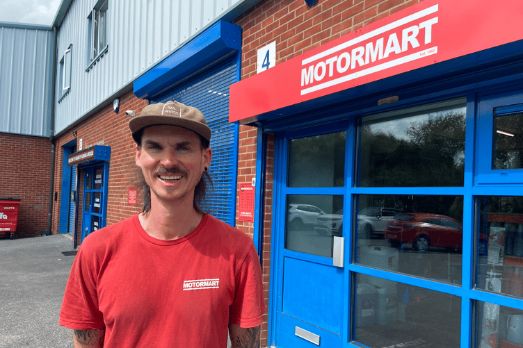 Co-owner Ash outside Motormart's new home at Unit 4 in Olympus Business Park