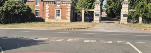 Red crosses painted on a junction in Exminster. Photo Exminster Online 